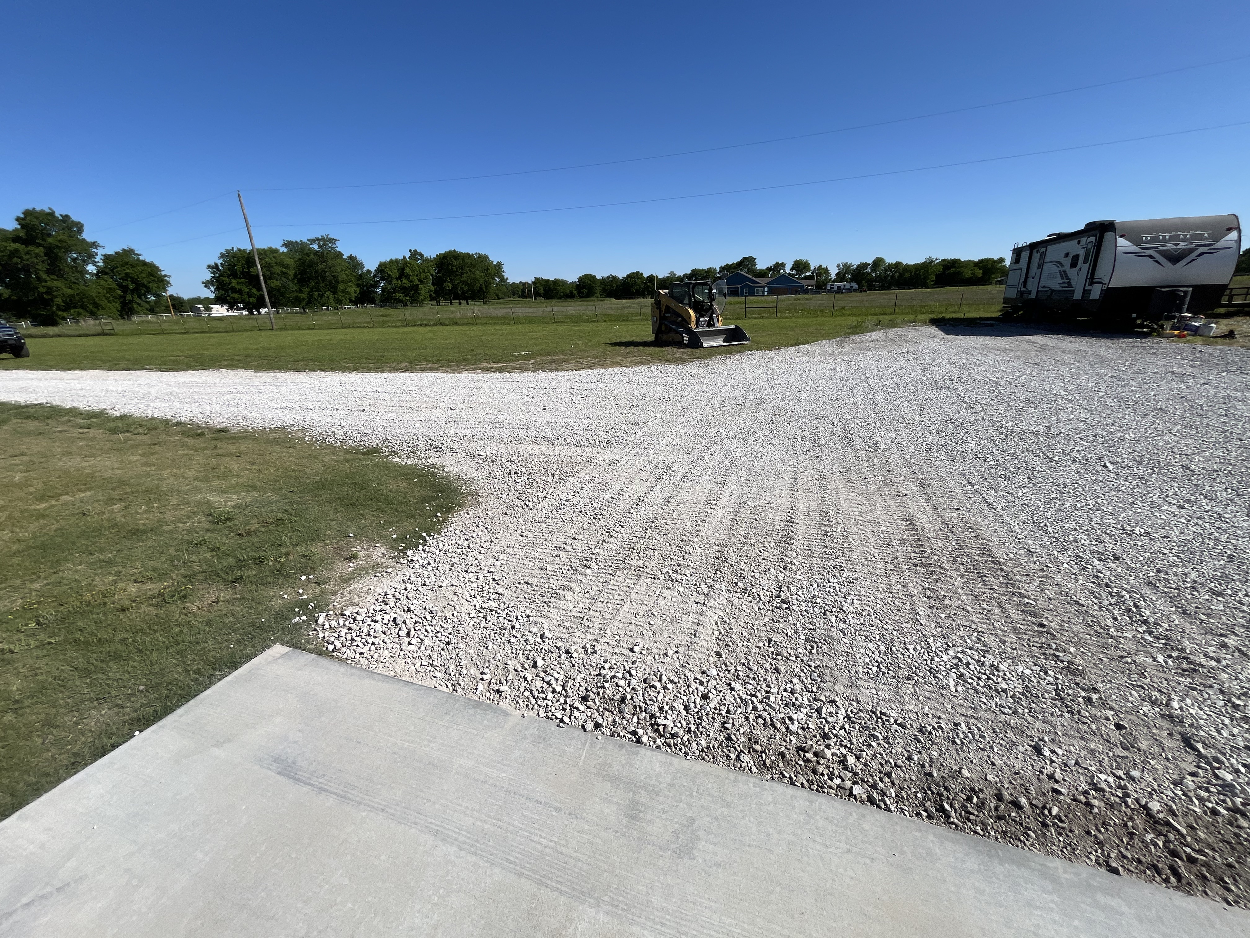 Fresh gravel driveway installation by Lifted Construction LLC